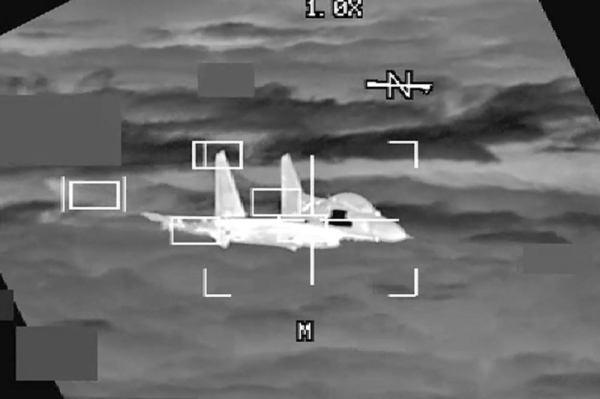 Officials: Chinese fighter jet came dangerously close to colliding with U.S. B-52 Officials: Chinese fighter jet came dangerously close to colliding with U.S. B-52