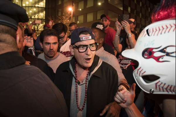 Police arrest Charlie Sheen's neighbor after actor says he was assaulted at Malibu home Police arrest Charlie Sheen's neighbor after actor says he was assaulted at Malibu home