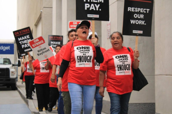Thousands of hotel workers strike for better wages, fairer workloads Thousands of hotel workers strike for better wages, fairer workloads
