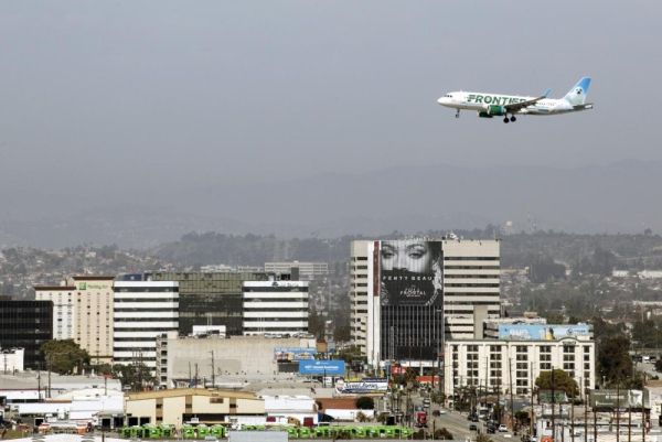 Frontier flight catches fire while landing in Las Vegas Frontier flight catches fire while landing in Las Vegas