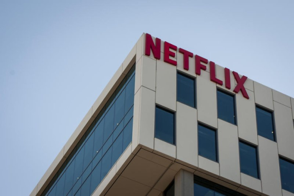 Netflix shares rise 11% as third-quarter results beat expectations, membership rises Netflix shares rise 11% as third-quarter results beat expectations, membership rises