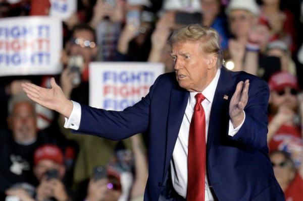 Police detain armed man near Trump's California rally Police detain armed man near Trump's California rally