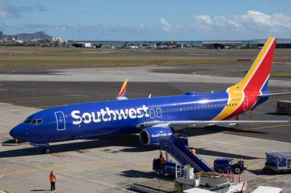 Bullet strikes Southwest Airlines plane preparing to depart Dallas airport Bullet strikes Southwest Airlines plane preparing to depart Dallas airport