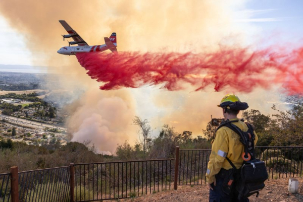 Fast-moving California wildfire destroys dozens of homes, forces thousands to flee Fast-moving California wildfire destroys dozens of homes, forces thousands to flee