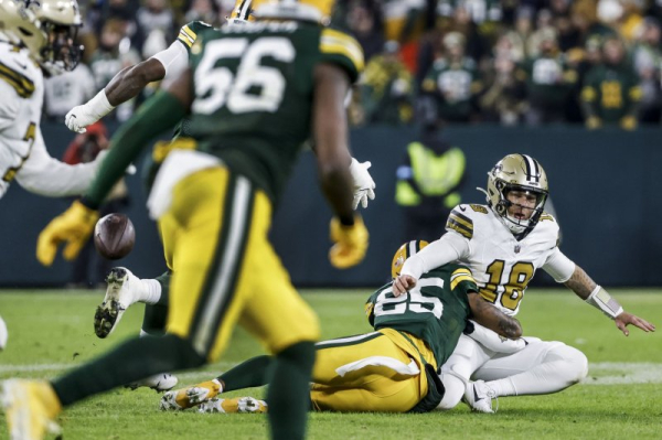 Josh Jacobs, defense help Packers roll over Saints, clinch playoff spot Josh Jacobs, defense help Packers roll over Saints, clinch playoff spot
