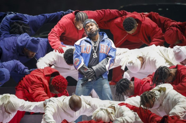 Super Bowl dancer banned by NFL; won't face charges for flag protest