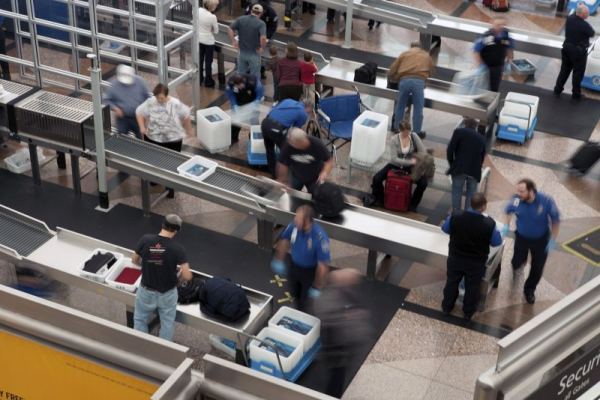 Passengers evacuate burning plane at Denver airport