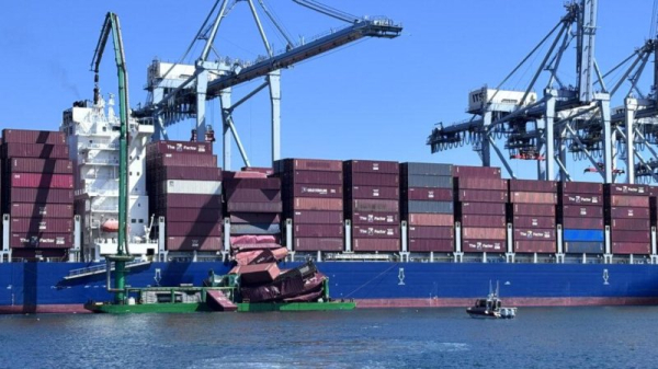 Dozens of shipping containers fall from vessel at California port
