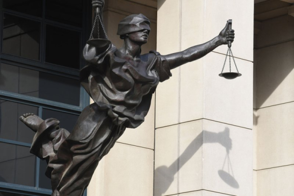 DOJ: woman extradited from Canada to U.S. for human smuggling deaths