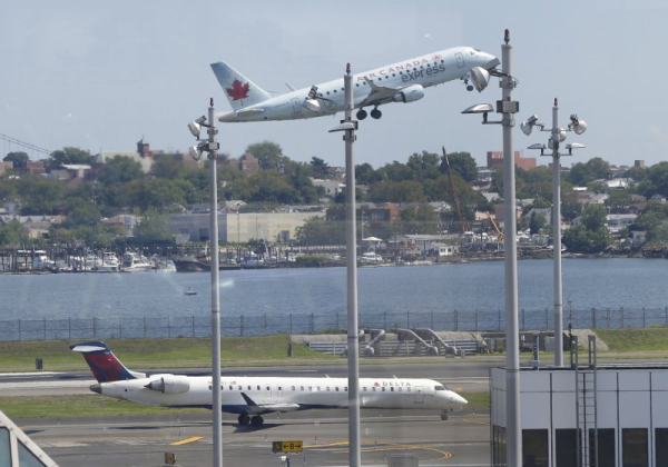 Two planes collide at LaGuardia, injuring one flight attendant