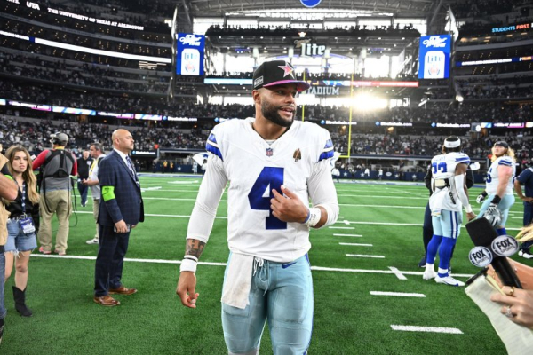 Cowboys honor Kneeland in 'therapeutic' thrashing of Raiders