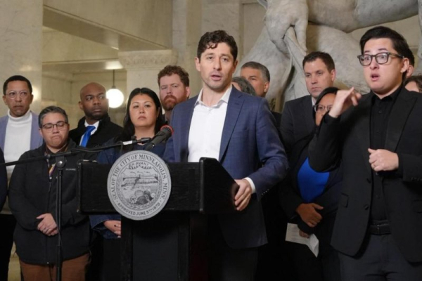 Minneapolis removes barriers near ICE shooting, keeps memorial