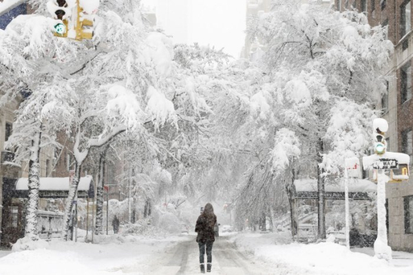 Blizzards blast Northeast with snow, hurricane force winds
