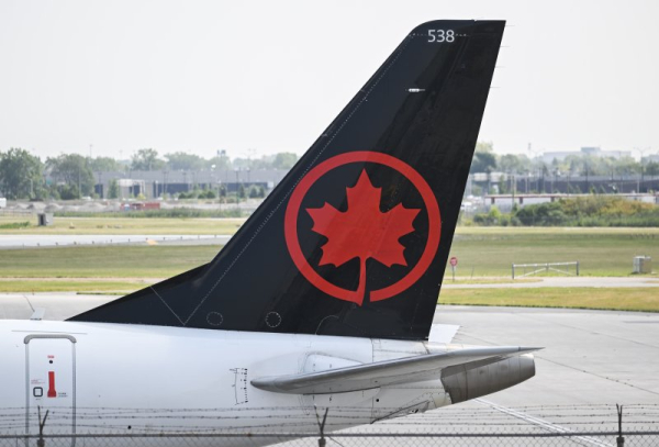Air Canada jet collides with vehicle on LaGuardia runway; FAA halts traffic