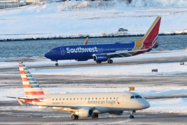 Air traffic snarled due to winter weather, government shutdown
