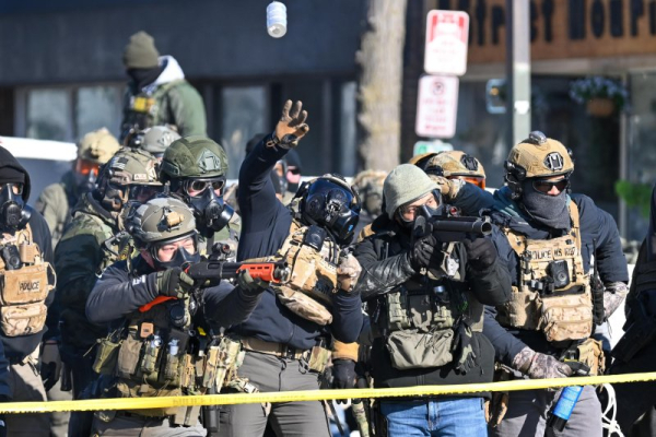 ICE agent charged, accused of shooting immigrant, making false report ICE agent charged, accused of shooting immigrant, making false report