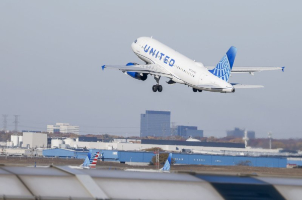 United flight diverted after 'unruly' passenger tried to enter cockpit United flight diverted after 'unruly' passenger tried to enter cockpit