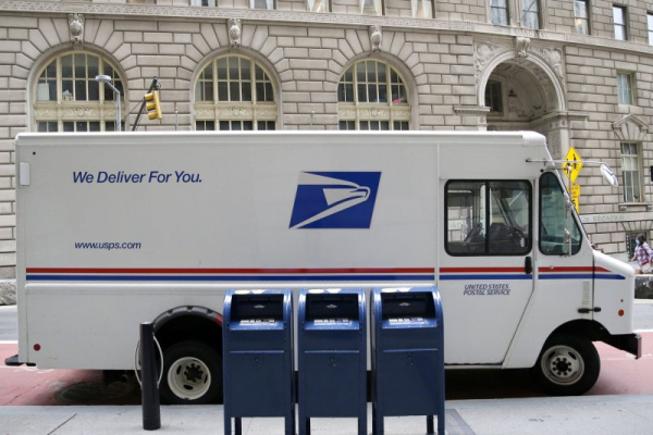 Judge blocks USPS plan to refuse to deliver mail-in ballots