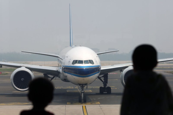 Pilot: Unruly passenger bites fellow flyer on American Airlines flight Pilot: Unruly passenger bites fellow flyer on American Airlines flight