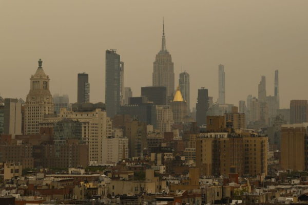 Thick, hazardous wildfire smoke spreads from Great Lakes to East Coast